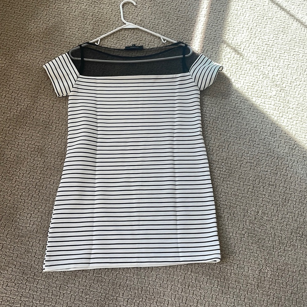 Mini dress .. mesh on top . I wear with jeans too .